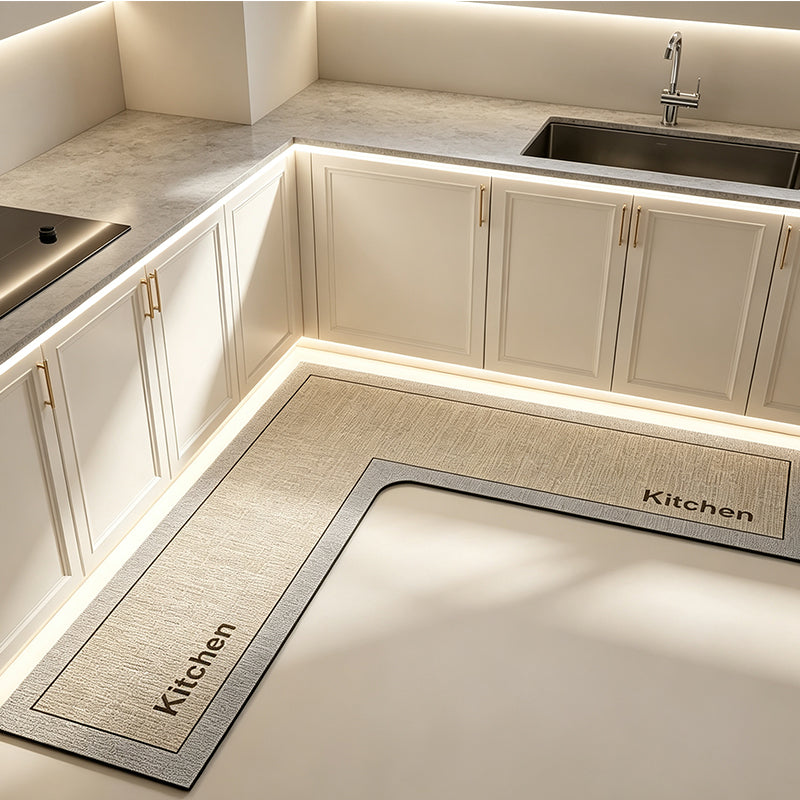 💧 Stop slipping on wet kitchen floors — this L-shaped mat absorbs water and oil fast, stays put, and cushions your feet while you cook. 🏠